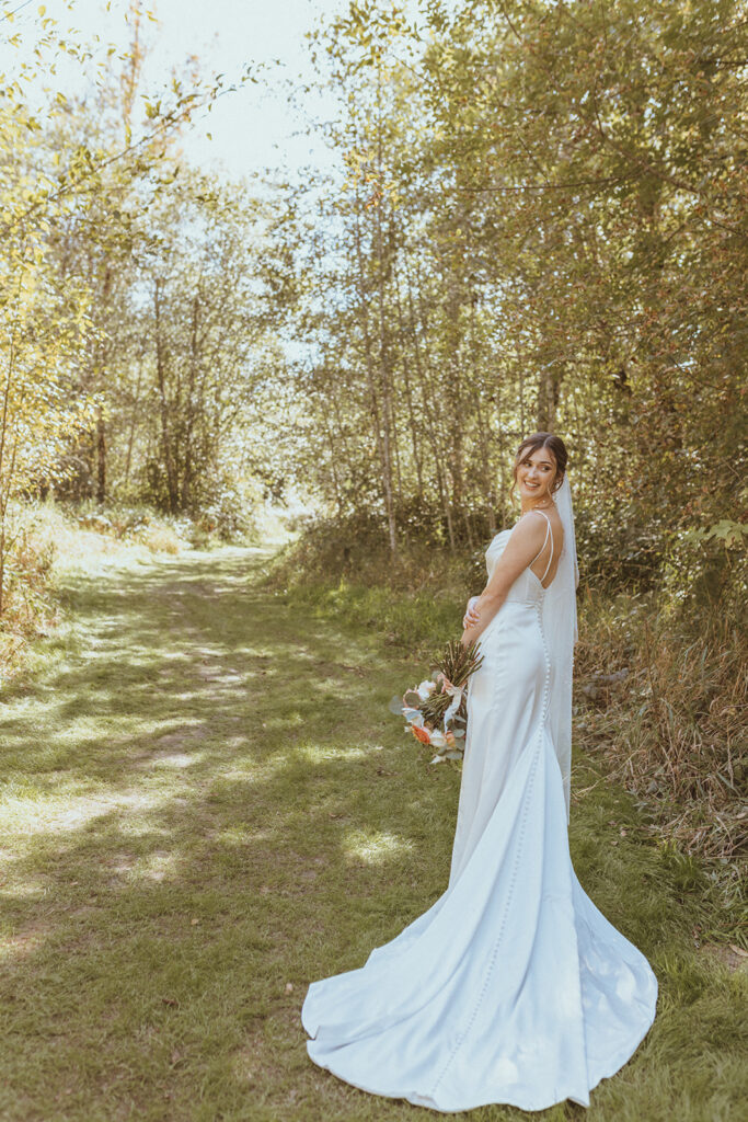 stunning picture of the bride at her dream backyard wedding