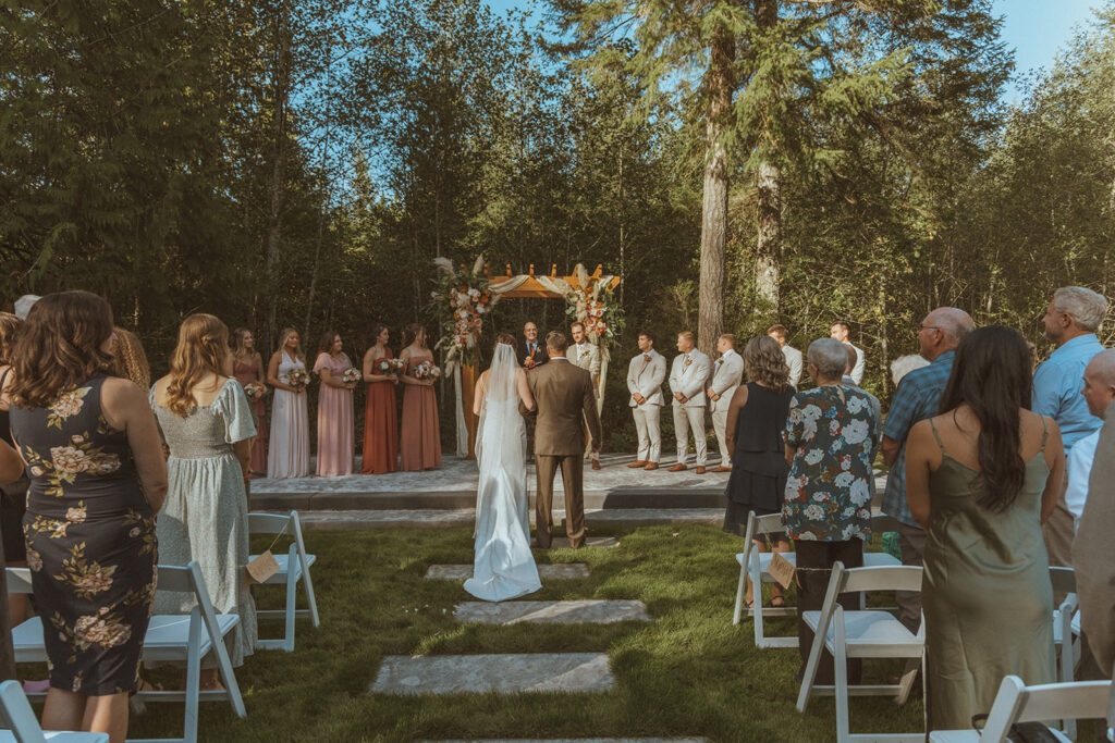 stunning picture of the bride walking down the aisle 