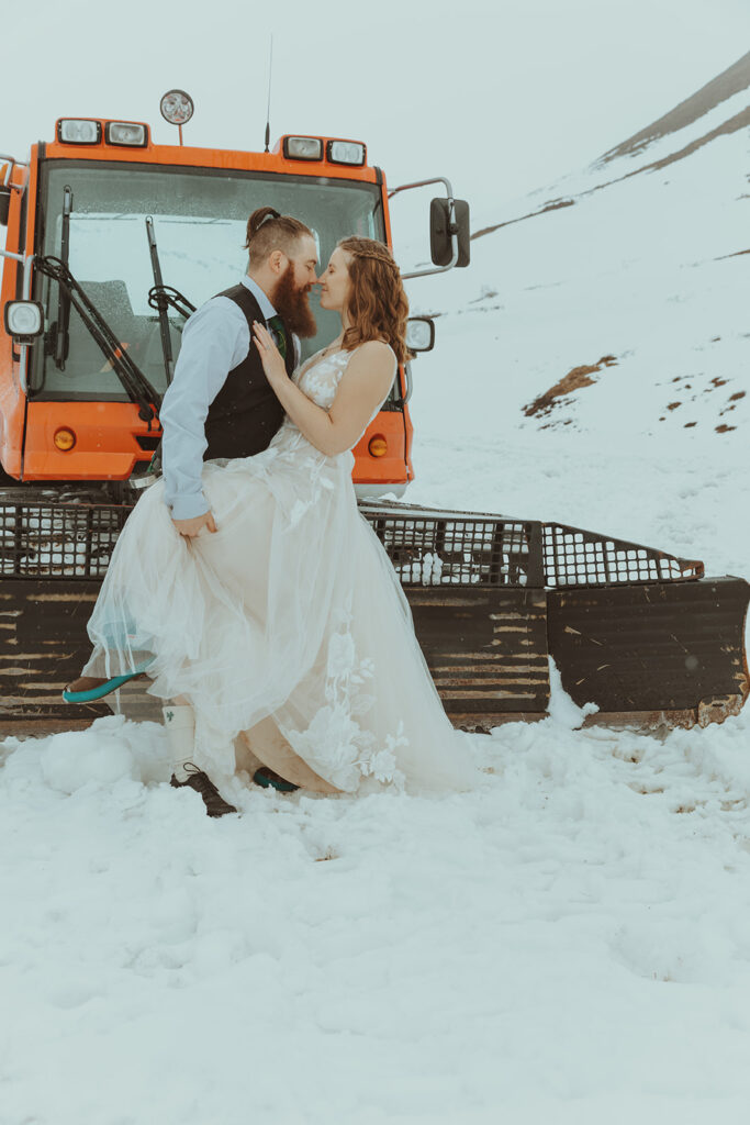 Bride and Groom kissing in winter elopement